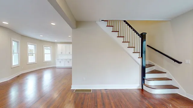 a view of entryway with wooden floor