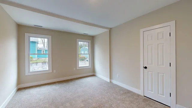 an empty room with windows