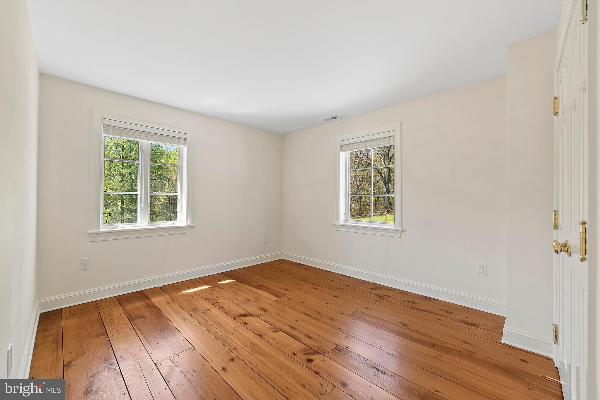 3651 Prince Road Marshall, VA 20115 - Photo 16 of 35 Guest Bedroom w/ heart of pine and hemlock floors