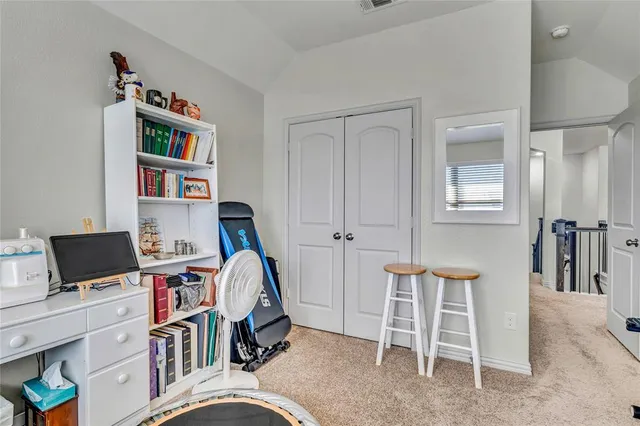 a view of a workspace with furniture