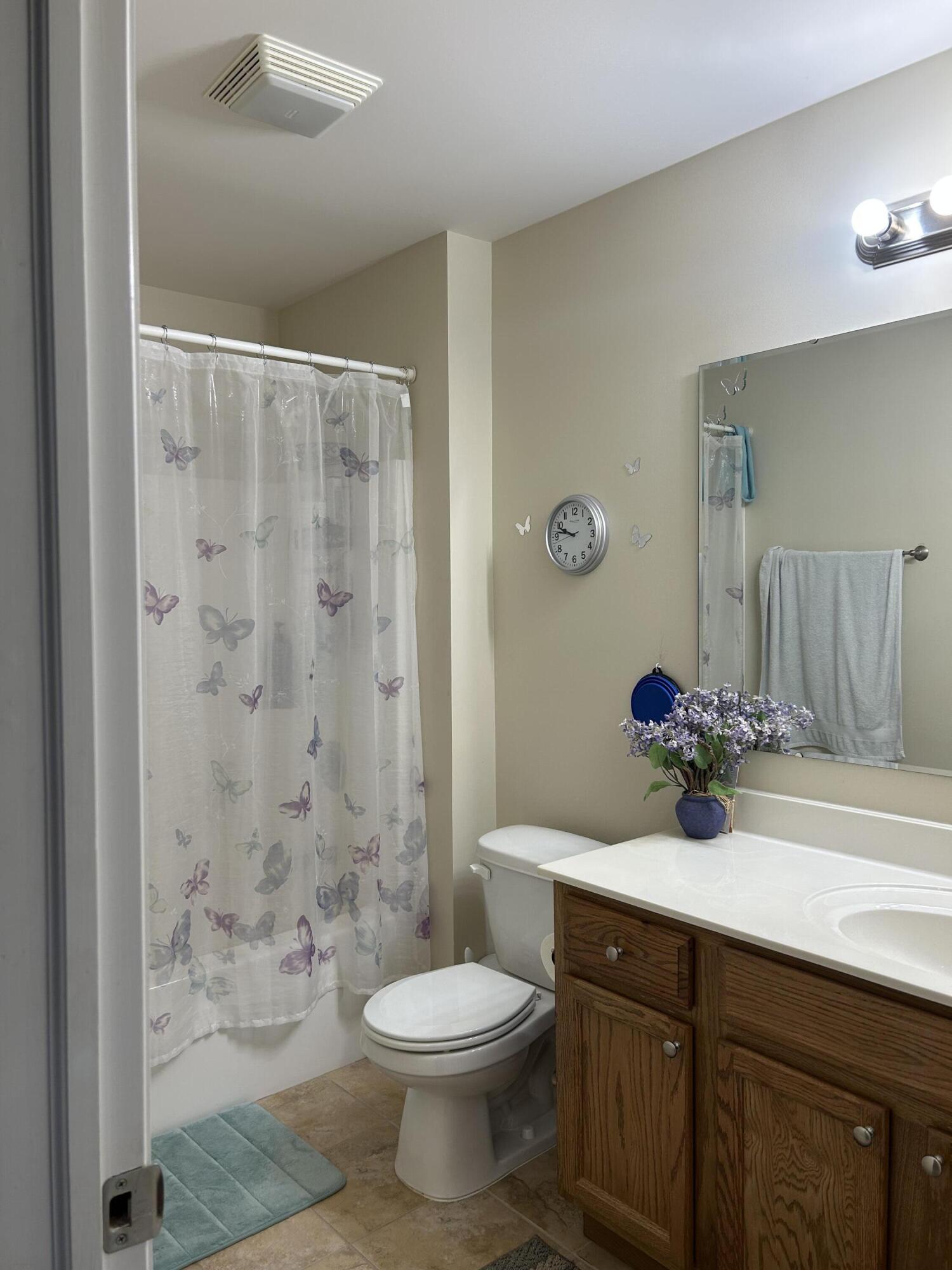 6029 Lexington Avenue Portage, IN 46368 - Photo 16 of 24 a bathroom with a sink a toilet and shower
