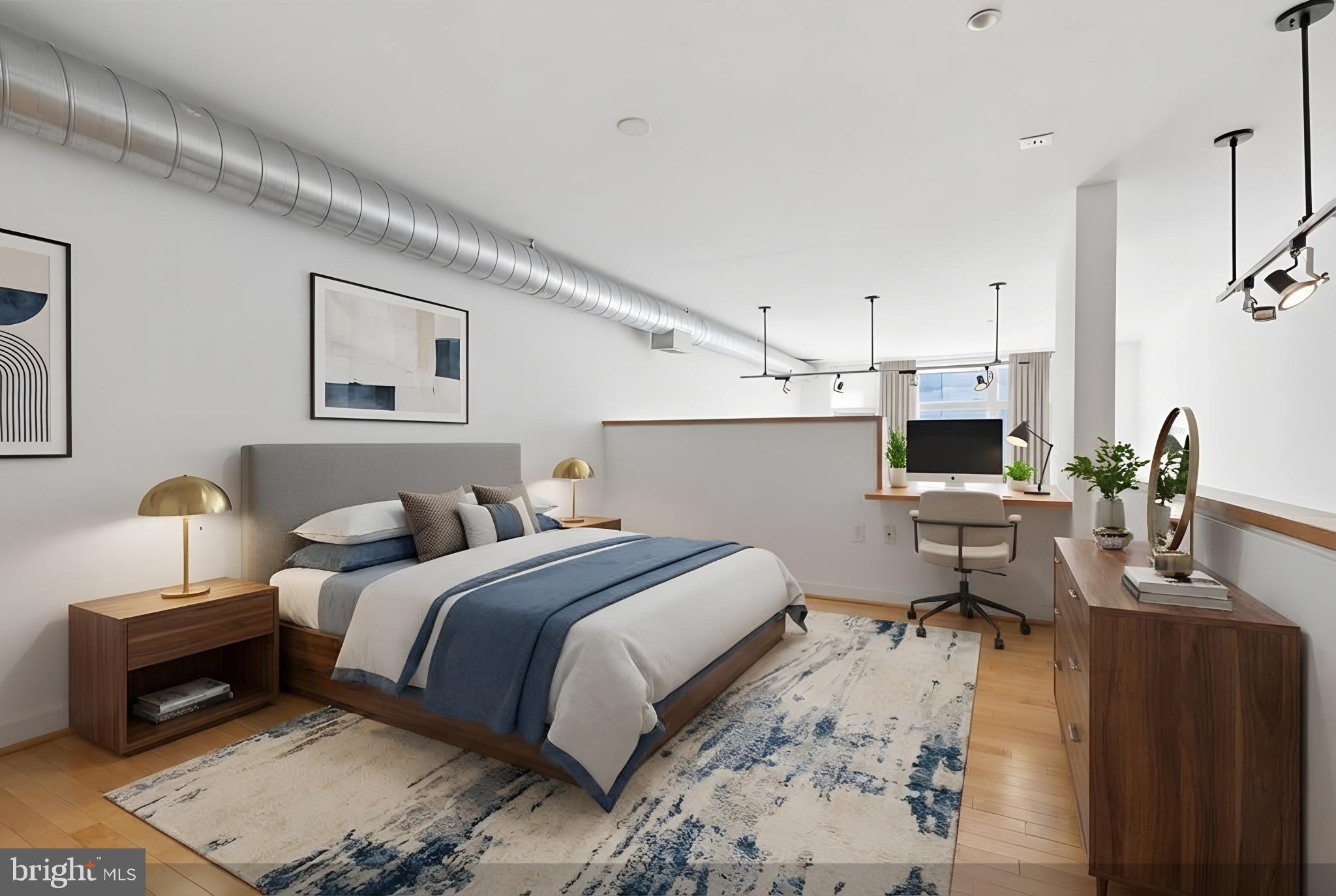 1390 V Street Northwest, Unit 307 Washington, DC 20009 - Photo 14 of 34 a bedroom with a bed and a desk