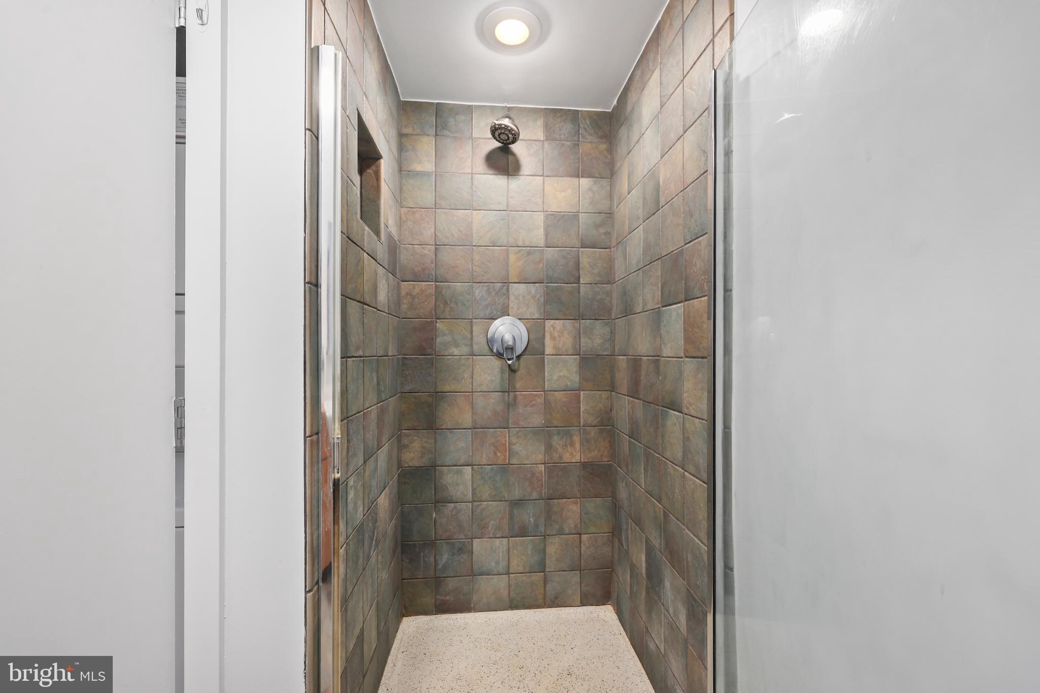 1390 V Street Northwest, Unit 307 Washington, DC 20009 - Photo 20 of 34 a bathroom with a shower and a toilet