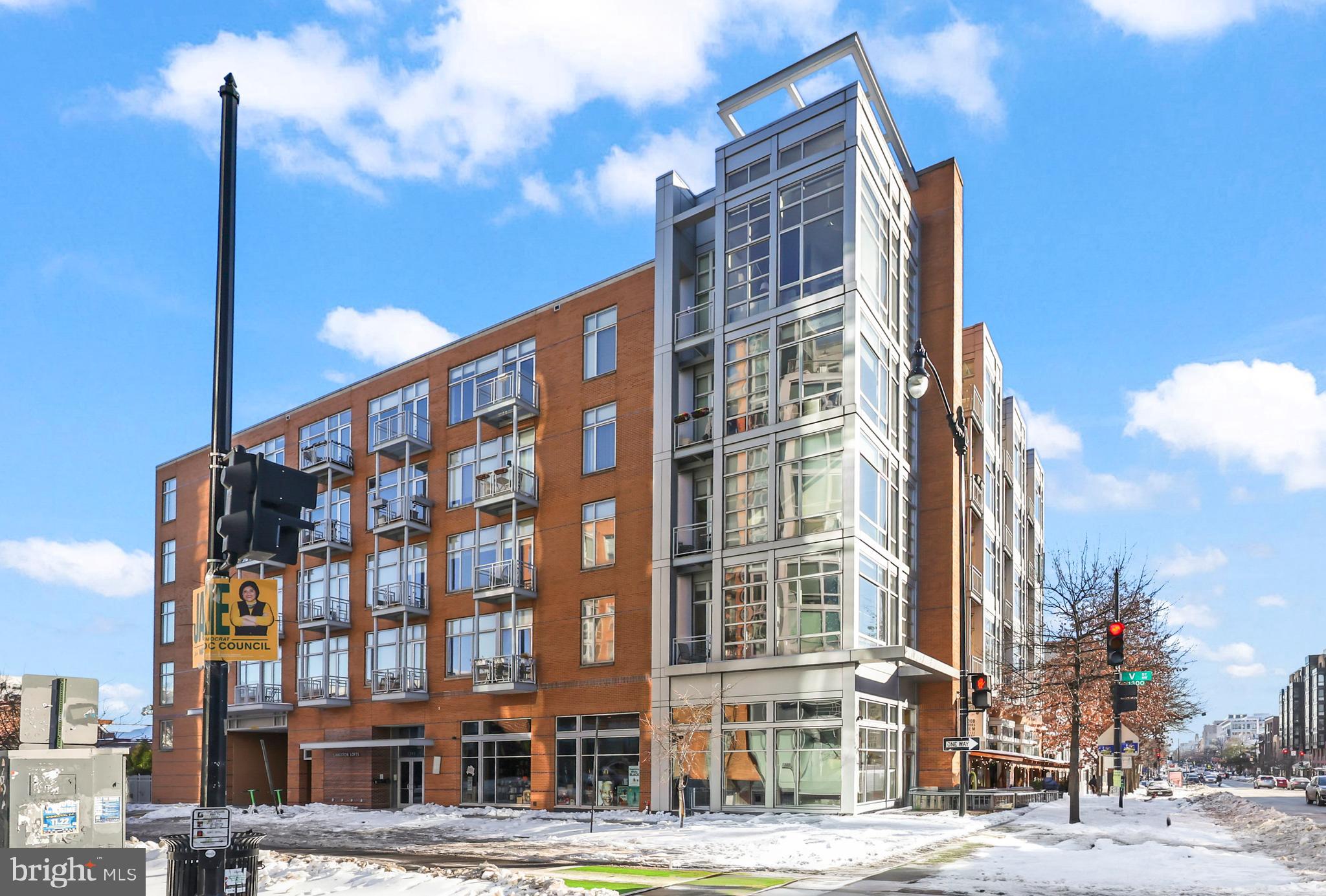 1390 V Street Northwest, Unit 307 Washington, DC 20009 - Photo 2 of 34 a front view of a building with a street