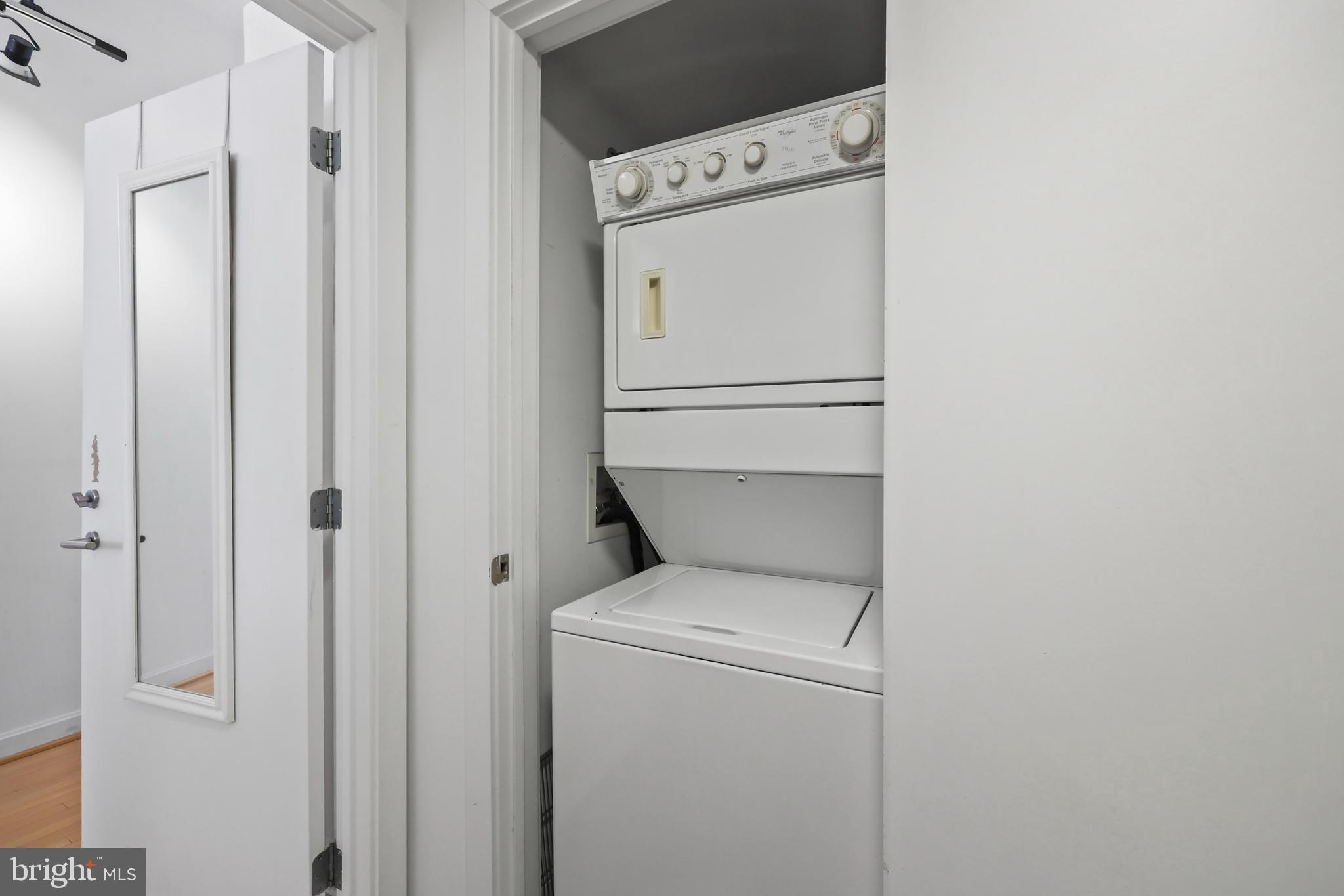 1390 V Street Northwest, Unit 307 Washington, DC 20009 - Photo 21 of 34 a utility room with dryer and washer