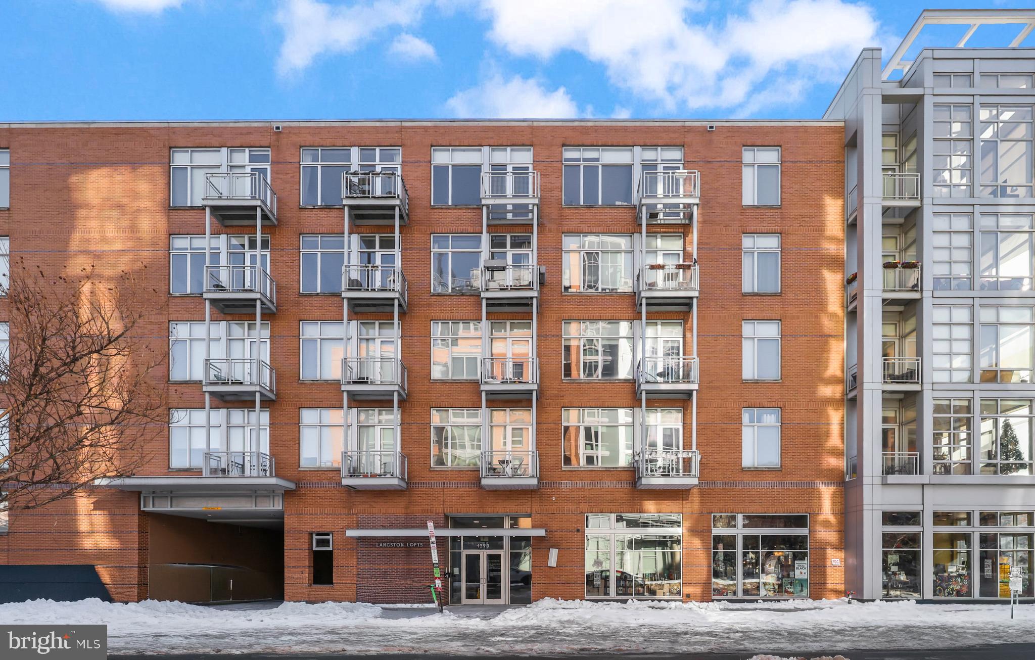 1390 V Street Northwest, Unit 307 Washington, DC 20009 - Photo 26 of 34 a front view of a building with glass windows