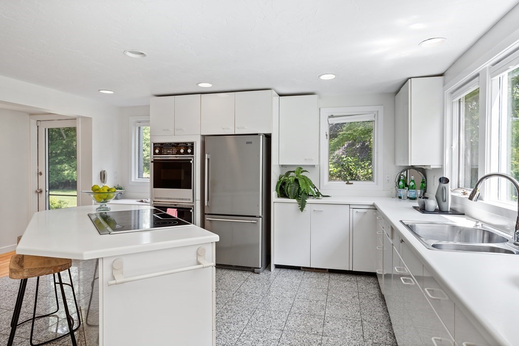 11 Farrar Road Lincoln, MA 01773 - Photo 14 of 37 a kitchen with a sink cabinets and appliances