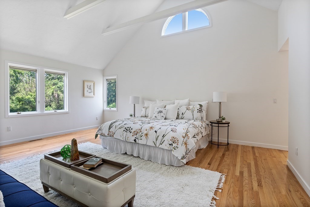 11 Farrar Road Lincoln, MA 01773 - Photo 21 of 37 a bedroom with a bed and wooden floor