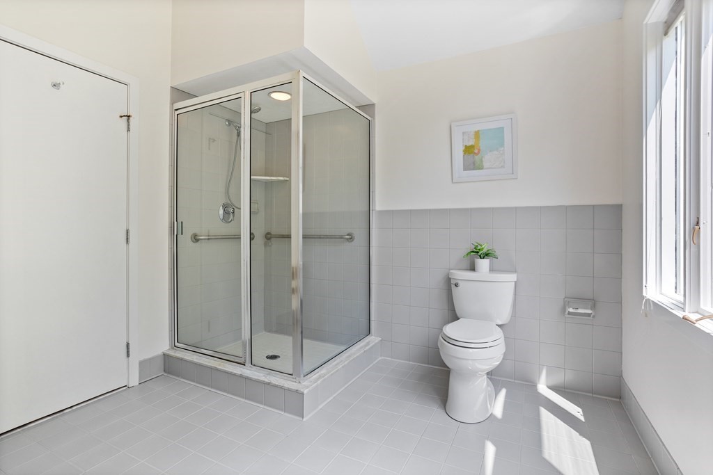 11 Farrar Road Lincoln, MA 01773 - Photo 26 of 37 a bathroom with a shower and a toilet
