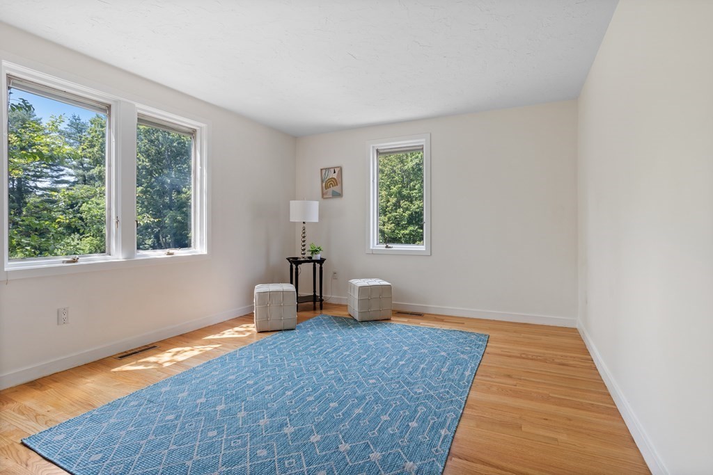 11 Farrar Road Lincoln, MA 01773 - Photo 27 of 37 a bedroom with a bed and a window