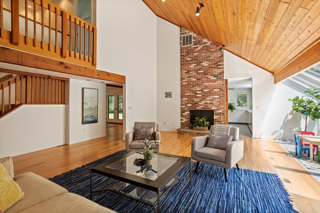 11 Farrar Road Lincoln, MA 01773 - Photo 7 of 37 a outdoor space with patio the couches and a dining table with chairs