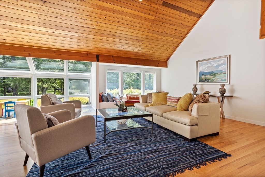 11 Farrar Road Lincoln, MA 01773 - Photo 8 of 37 a living room with furniture and a large window