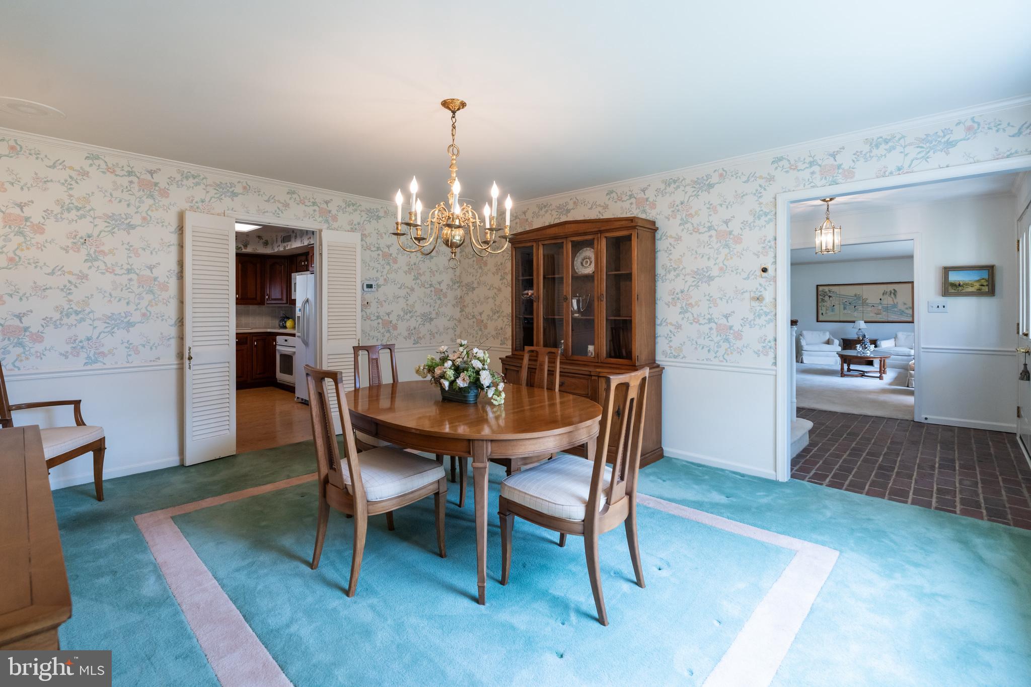 857 Hunt Road Newtown Square, PA 19073 - Photo 8 of 52 a view of a dining room with furniture and wooden floor