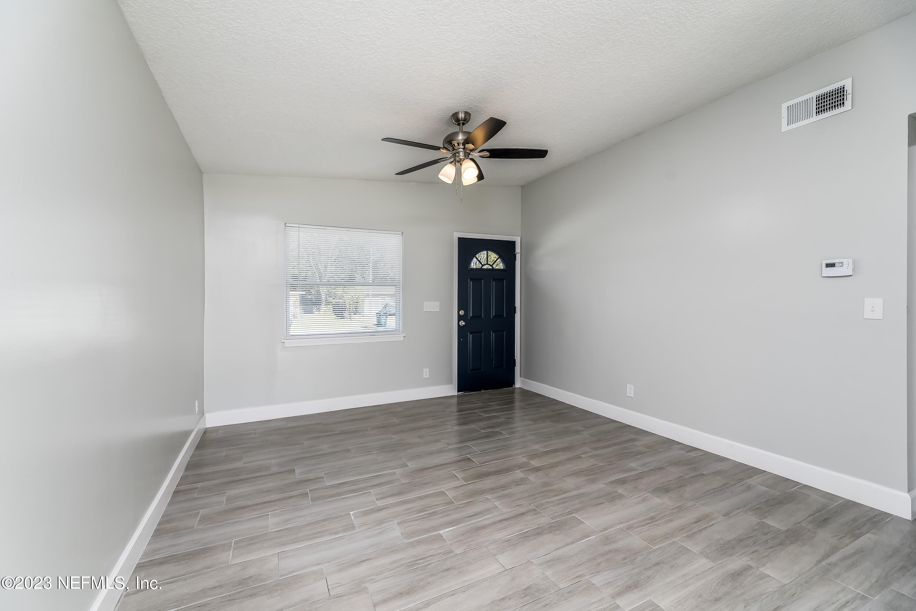 10432 Ebbitt Road Jacksonville, FL 32246 - Photo 3 of 30 Front Entrance/Living Room