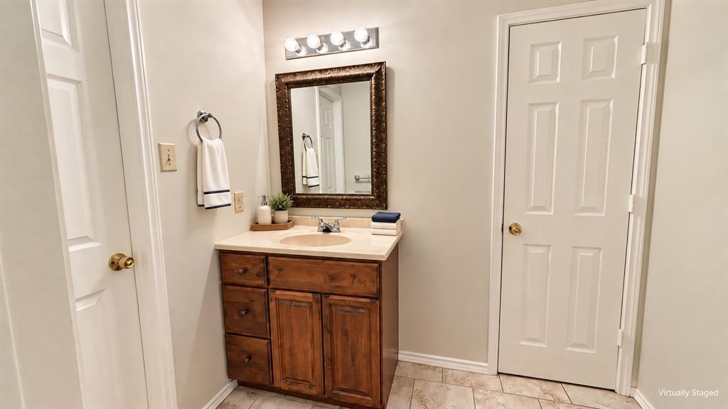 628 Raintree Circle Coppell, TX 75019 - Photo 18 of 30 Upstairs sink area