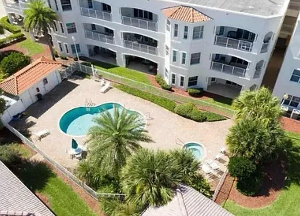 a view of building with yard