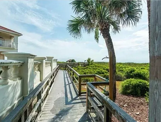 a view of a balcony with an ocean view