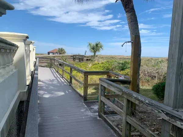 a view of balcony with furniture