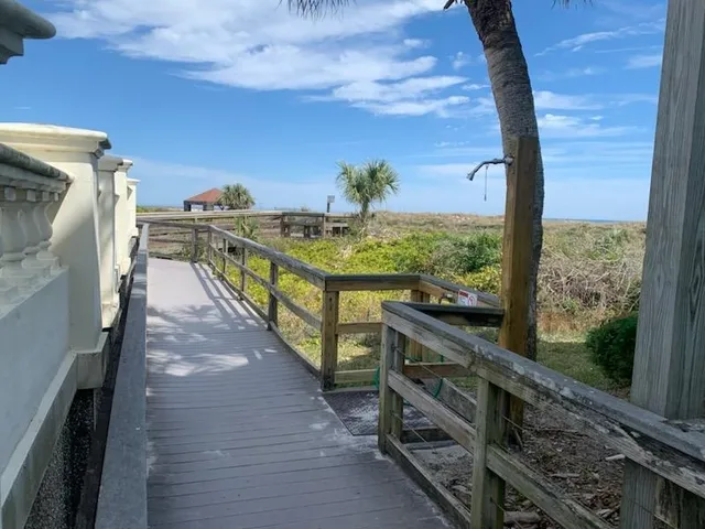 a view of balcony with furniture