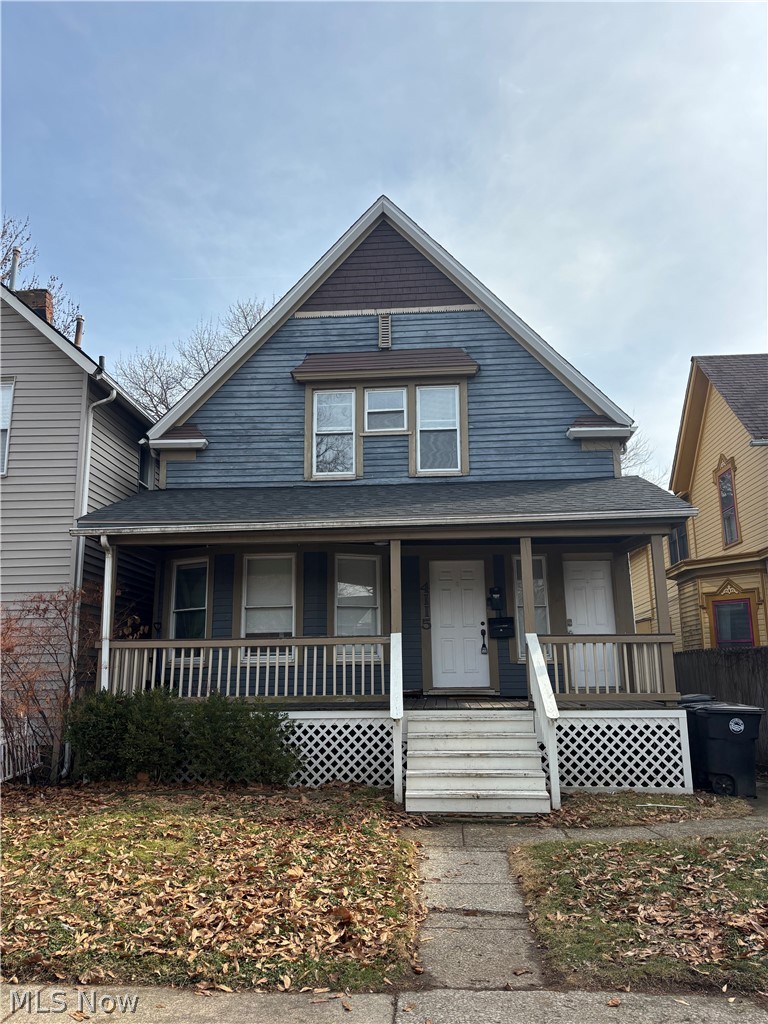 Bungalow-style home with a porch and a shingled roof