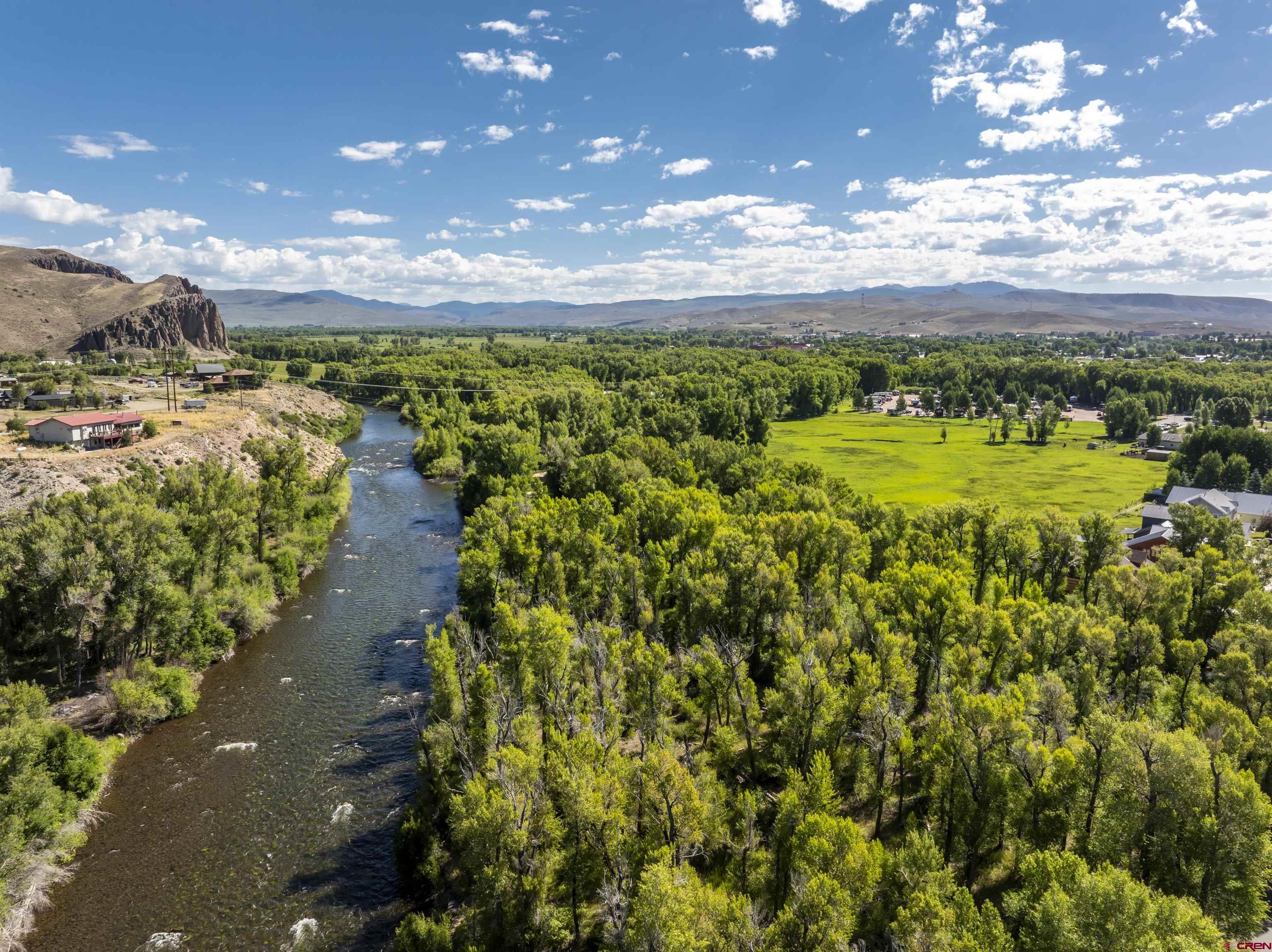 Rainbow Acres Lane Gunnison, CO 81230 - Photo 1 of 19 a view of a lake with houses
