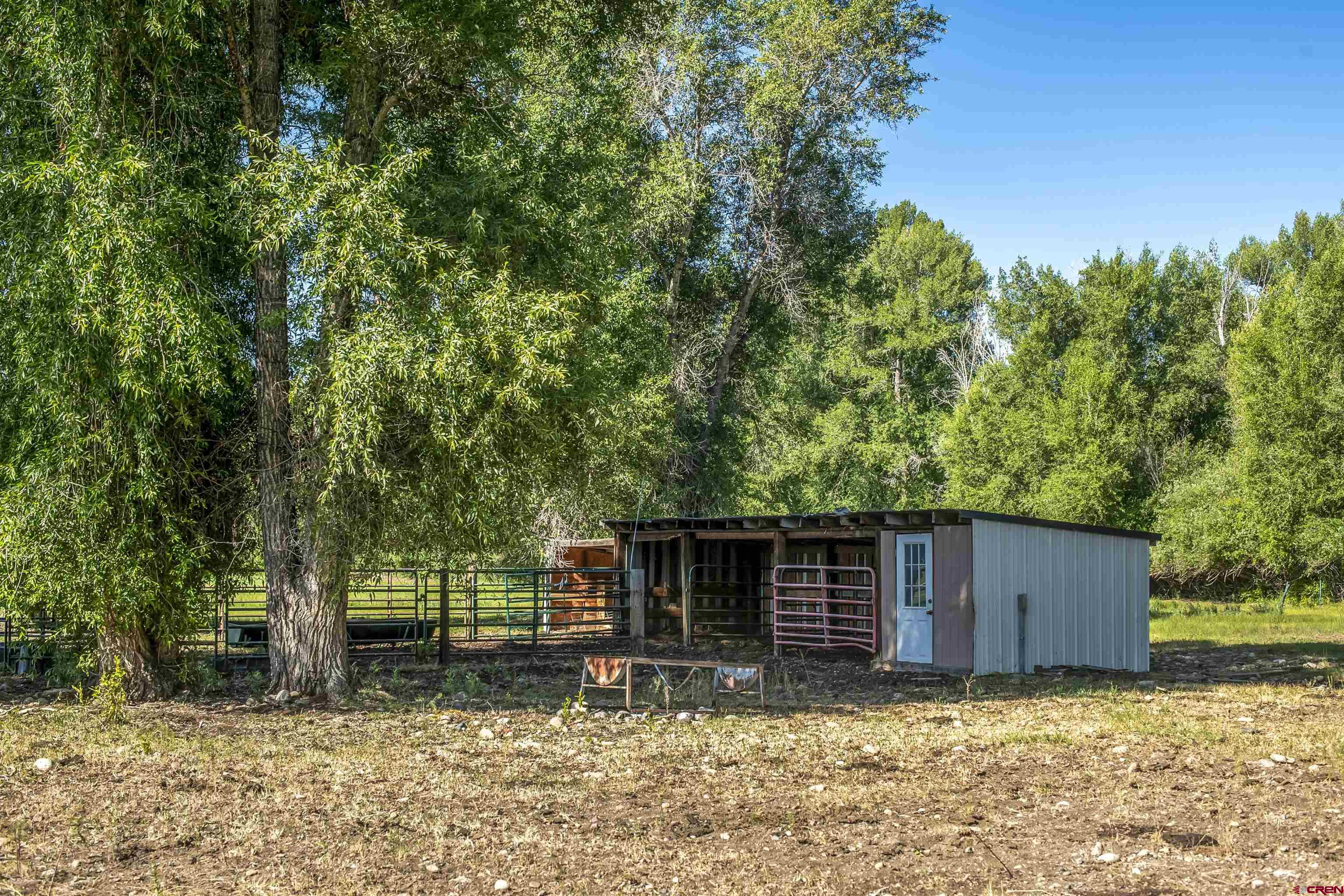 Rainbow Acres Lane Gunnison, CO 81230 - Photo 15 of 19 a view of a house with a yard