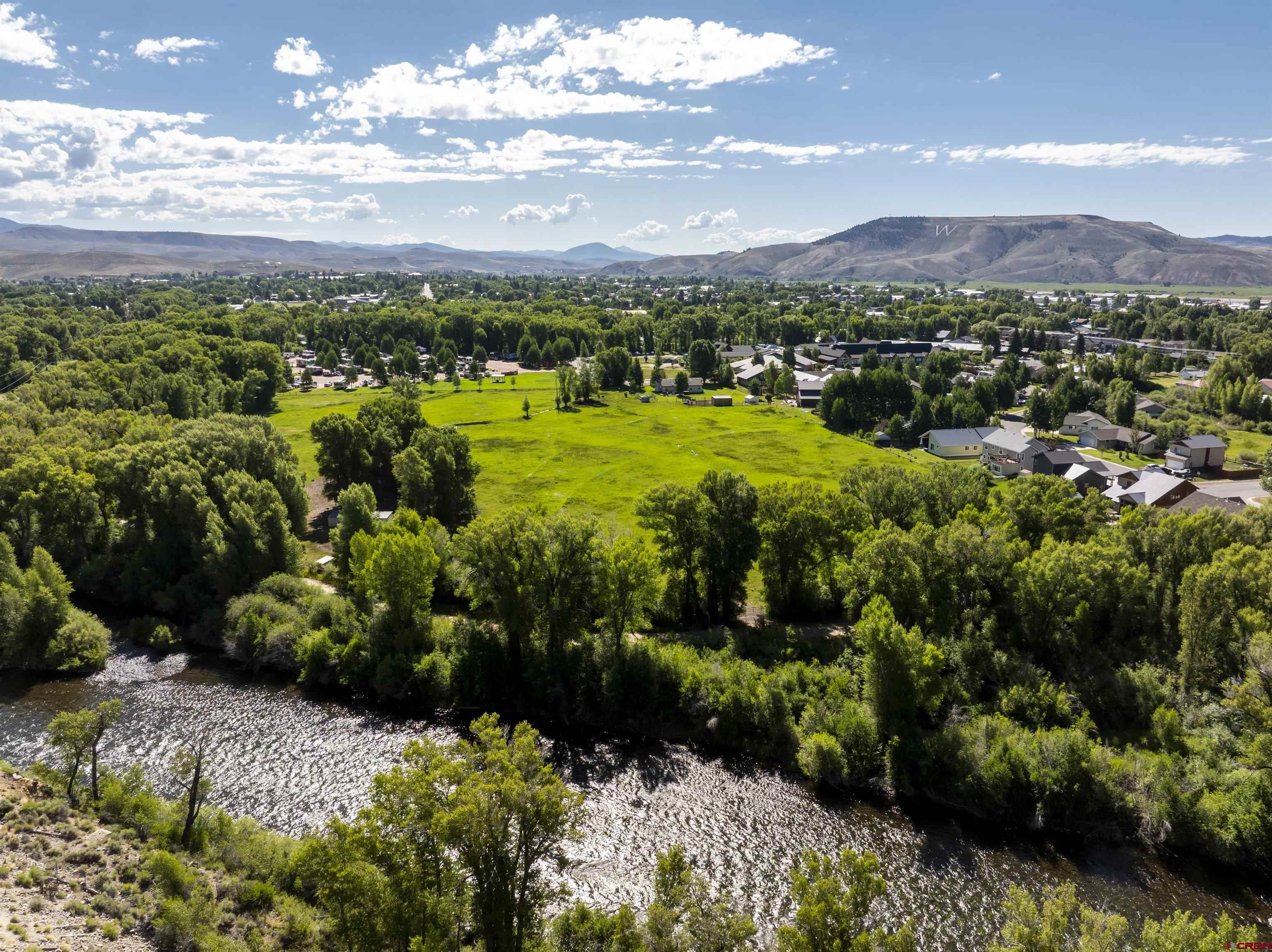 Rainbow Acres Lane Gunnison, CO 81230 - Photo 2 of 19 a view of a city with lots of plants