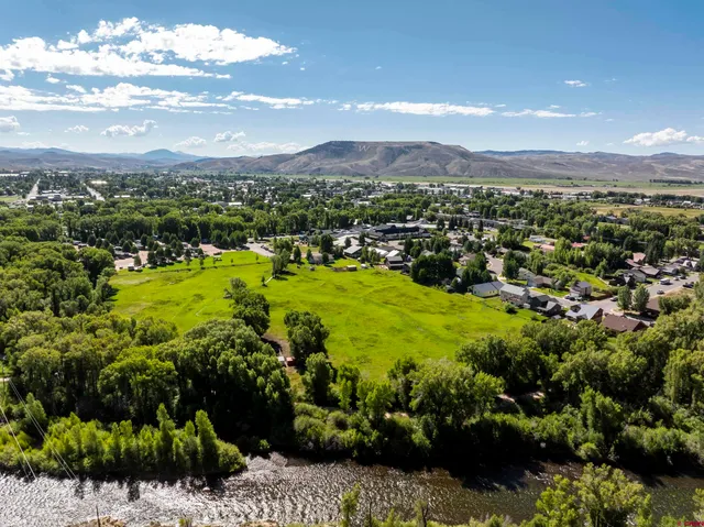 a view of a city with mountains in the background