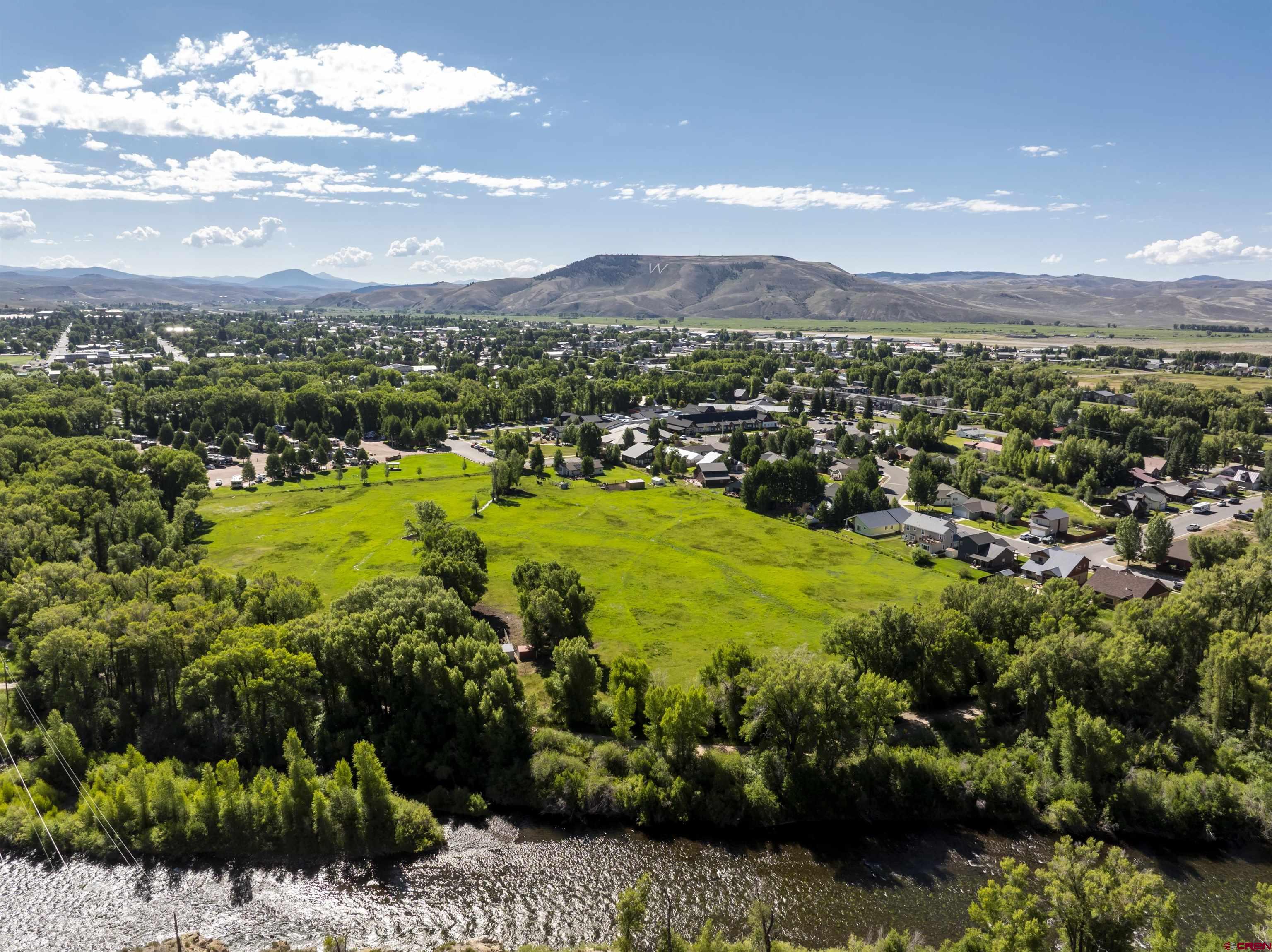 Rainbow Acres Lane Gunnison, CO 81230 - Photo 3 of 19 a view of a city with mountains in the background