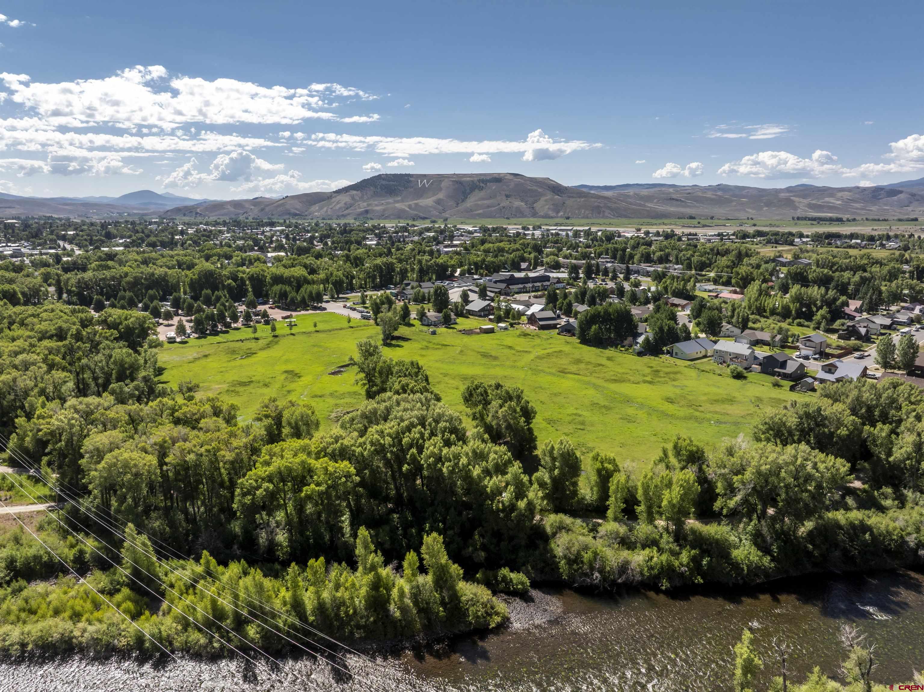 Rainbow Acres Lane Gunnison, CO 81230 - Photo 4 of 19 a view of a city with mountains in the background