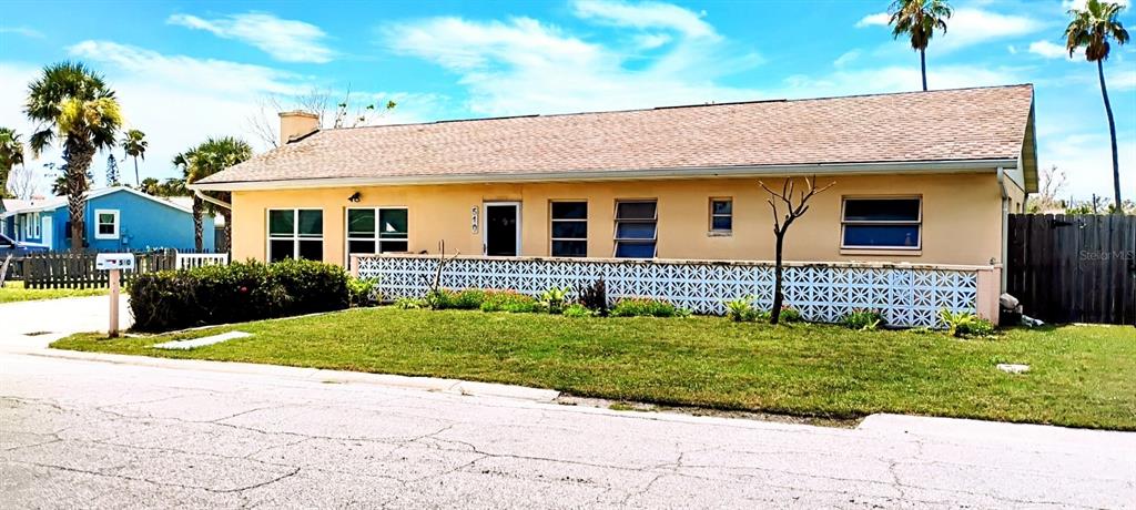 510 Marlyn Way Madeira Beach, FL 33708 - Photo 1 of 32 a view of a house with a yard