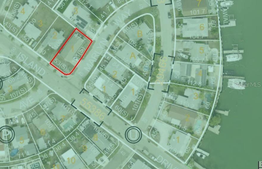 510 Marlyn Way Madeira Beach, FL 33708 - Photo 14 of 32 a bathroom with a shower and a mirror