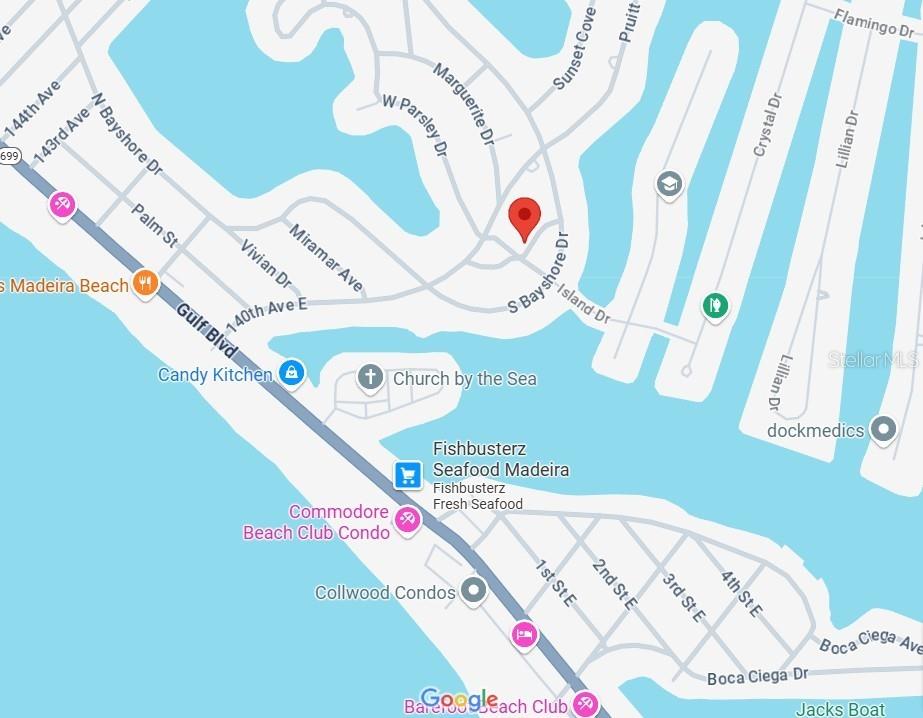 510 Marlyn Way Madeira Beach, FL 33708 - Photo 2 of 32 a picture of a book shelf