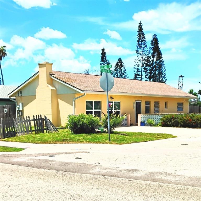 510 Marlyn Way Madeira Beach, FL 33708 - Photo 23 of 32 a view of house with a yard
