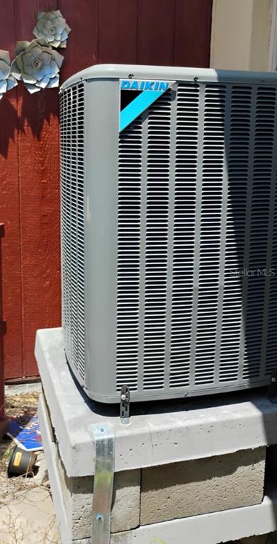 510 Marlyn Way Madeira Beach, FL 33708 - Photo 27 of 32 a view of wooden door with a chair