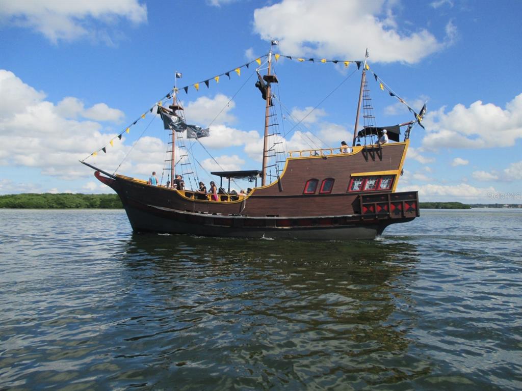 510 Marlyn Way Madeira Beach, FL 33708 - Photo 32 of 32 a view of a lake with a boat