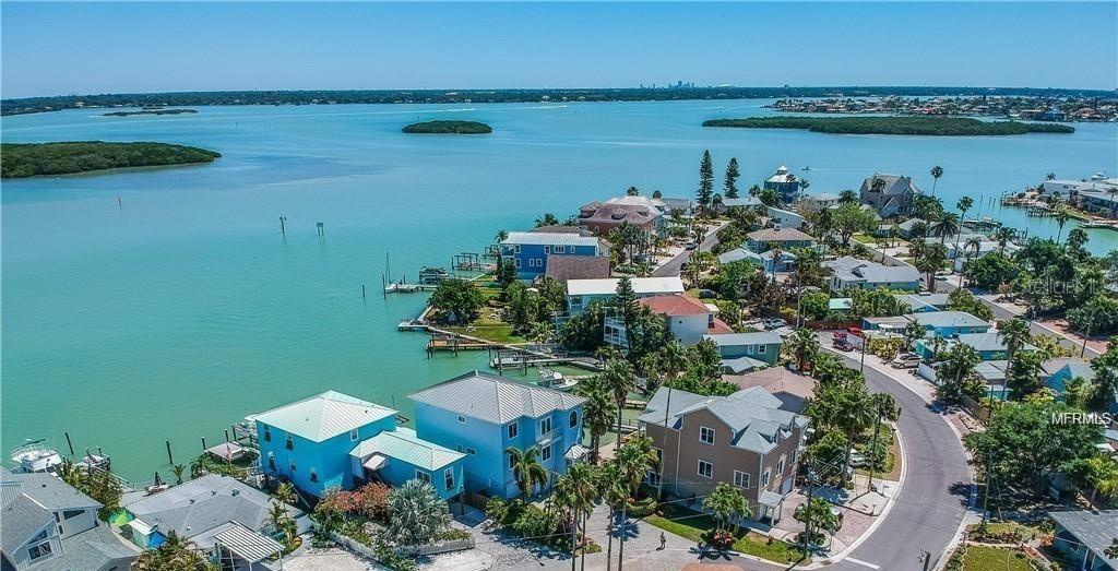 510 Marlyn Way Madeira Beach, FL 33708 - Photo 8 of 32 an aerial view of a house with a lake view