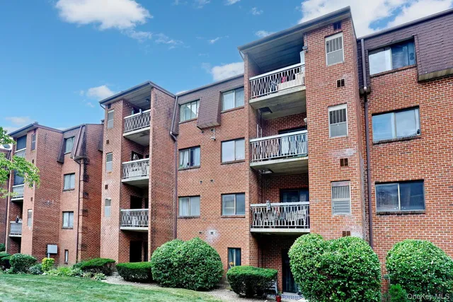 a front view of a multi story residential apartment building