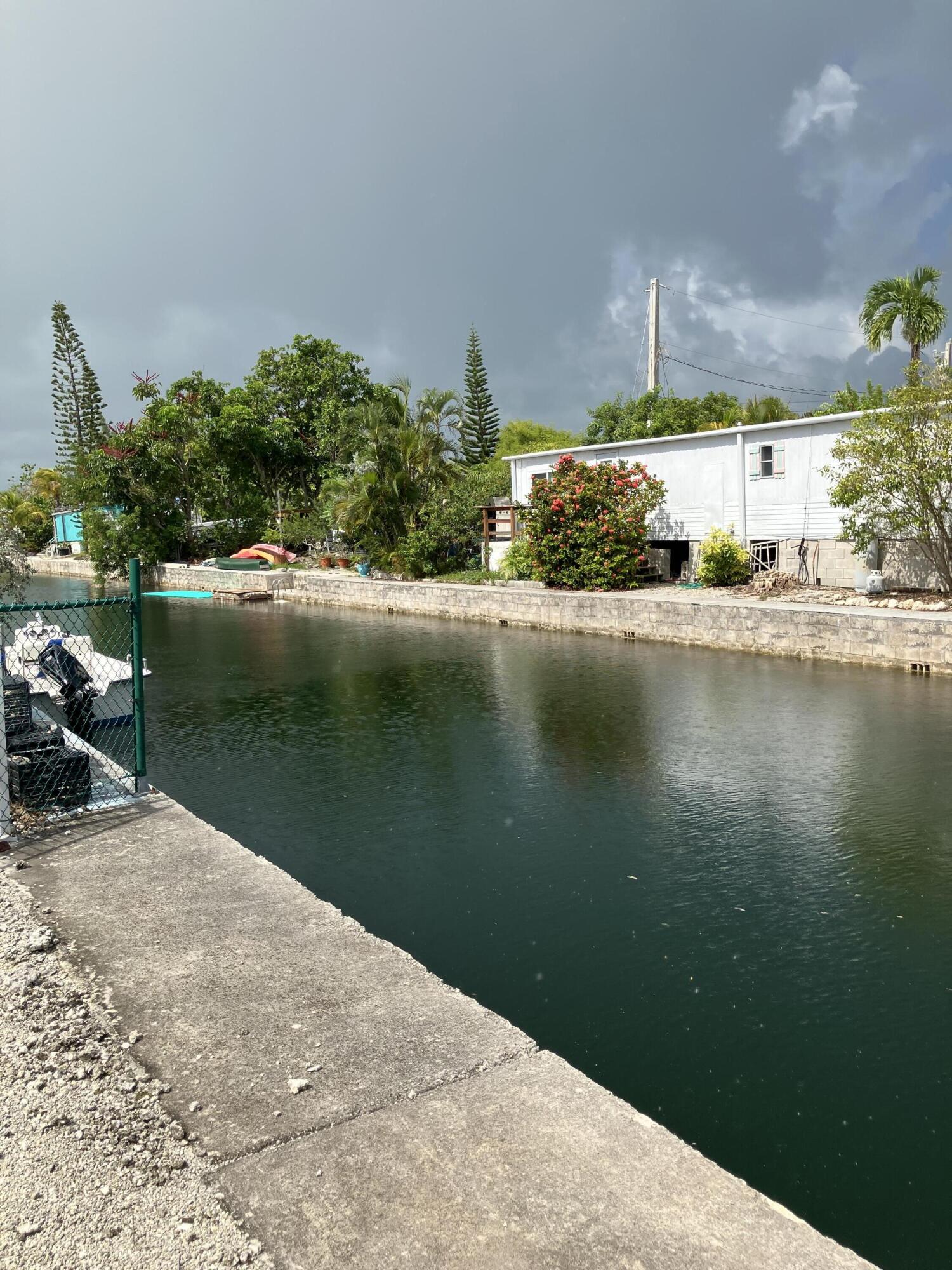330 Spica Lane Key West, FL 33040 - Photo 2 of 6 a house with lake view