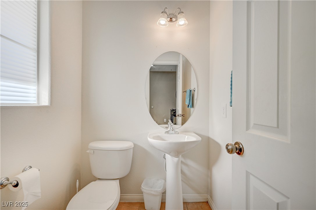 1168 Paradise River Road Henderson, NV 89002 - Photo 11 of 29 Half bath with toilet and baseboards