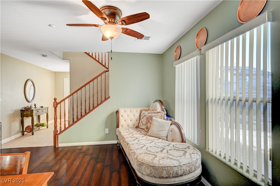 1168 Paradise River Road Henderson, NV 89002 - Photo 12 of 29 Living area featuring stairs, dark wood-type flooring, and ceiling fan