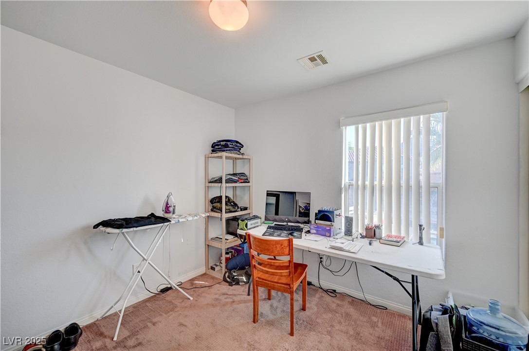 1168 Paradise River Road Henderson, NV 89002 - Photo 15 of 29 Office space featuring light carpet and baseboards