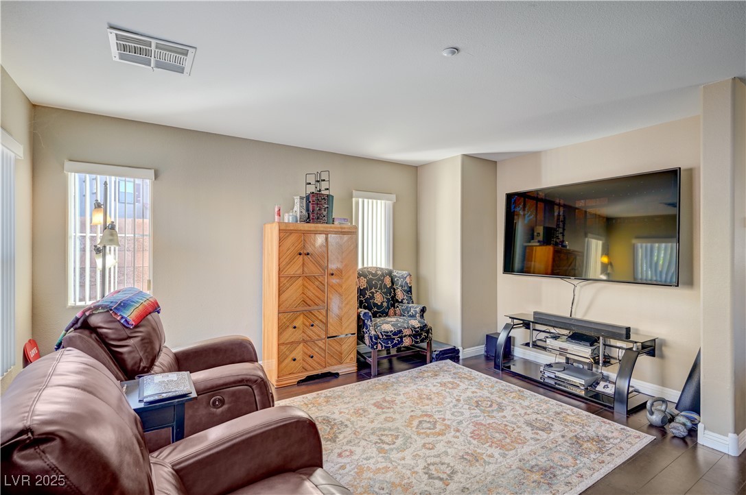 1168 Paradise River Road Henderson, NV 89002 - Photo 9 of 29 Living room with baseboards
