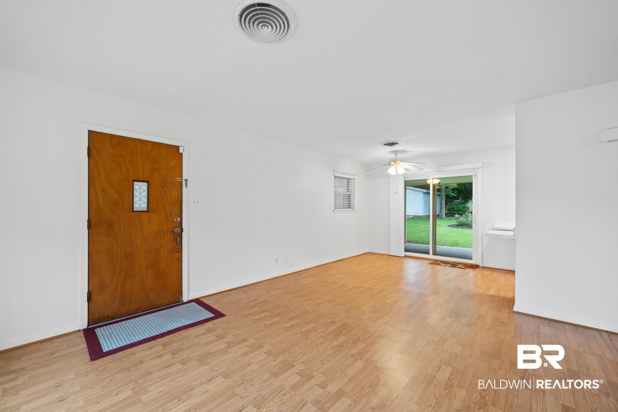 280 Thrift Street Mobile, AL 36609 - Photo 5 of 22 Interior space with ceiling fan and light wood-type flooring