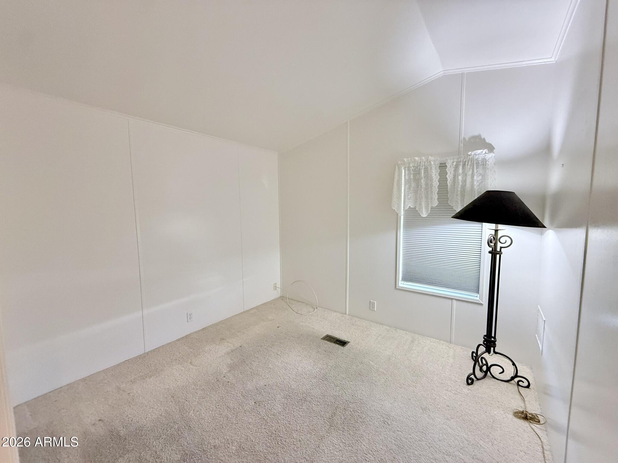 601 North Hayden Road, Unit 40 Scottsdale, AZ 85257 - Photo 14 of 48 a view of room with a ceiling fan and window