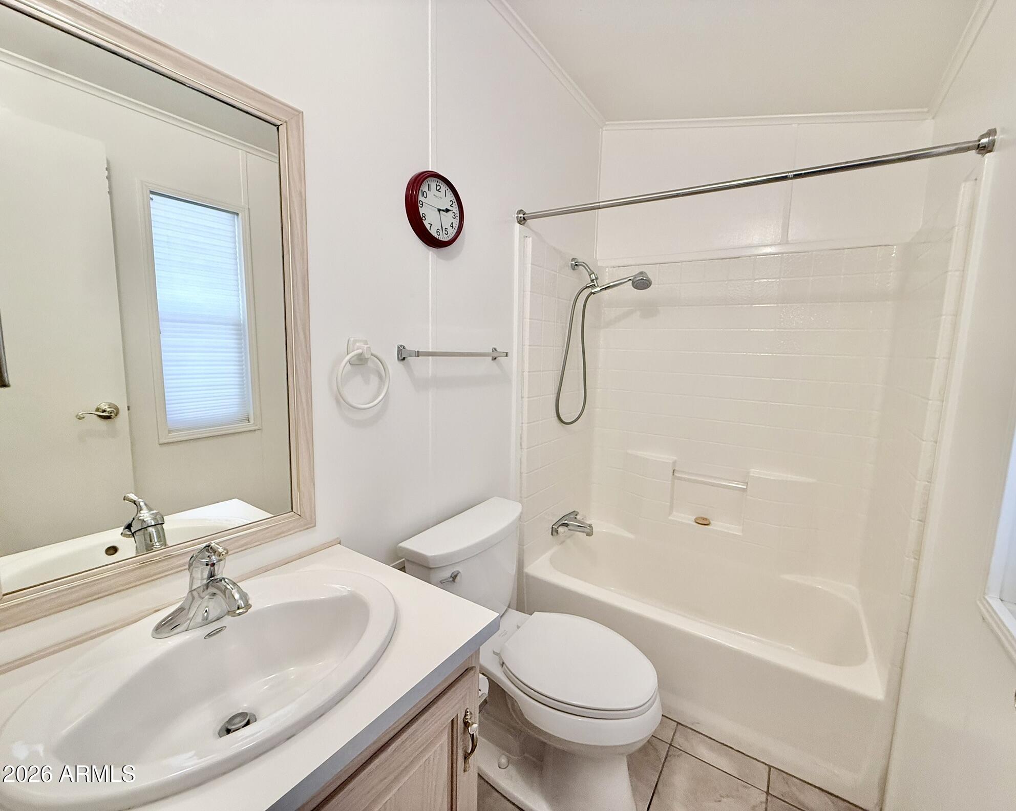 601 North Hayden Road, Unit 40 Scottsdale, AZ 85257 - Photo 16 of 48 a bathroom with a sink a toilet and shower