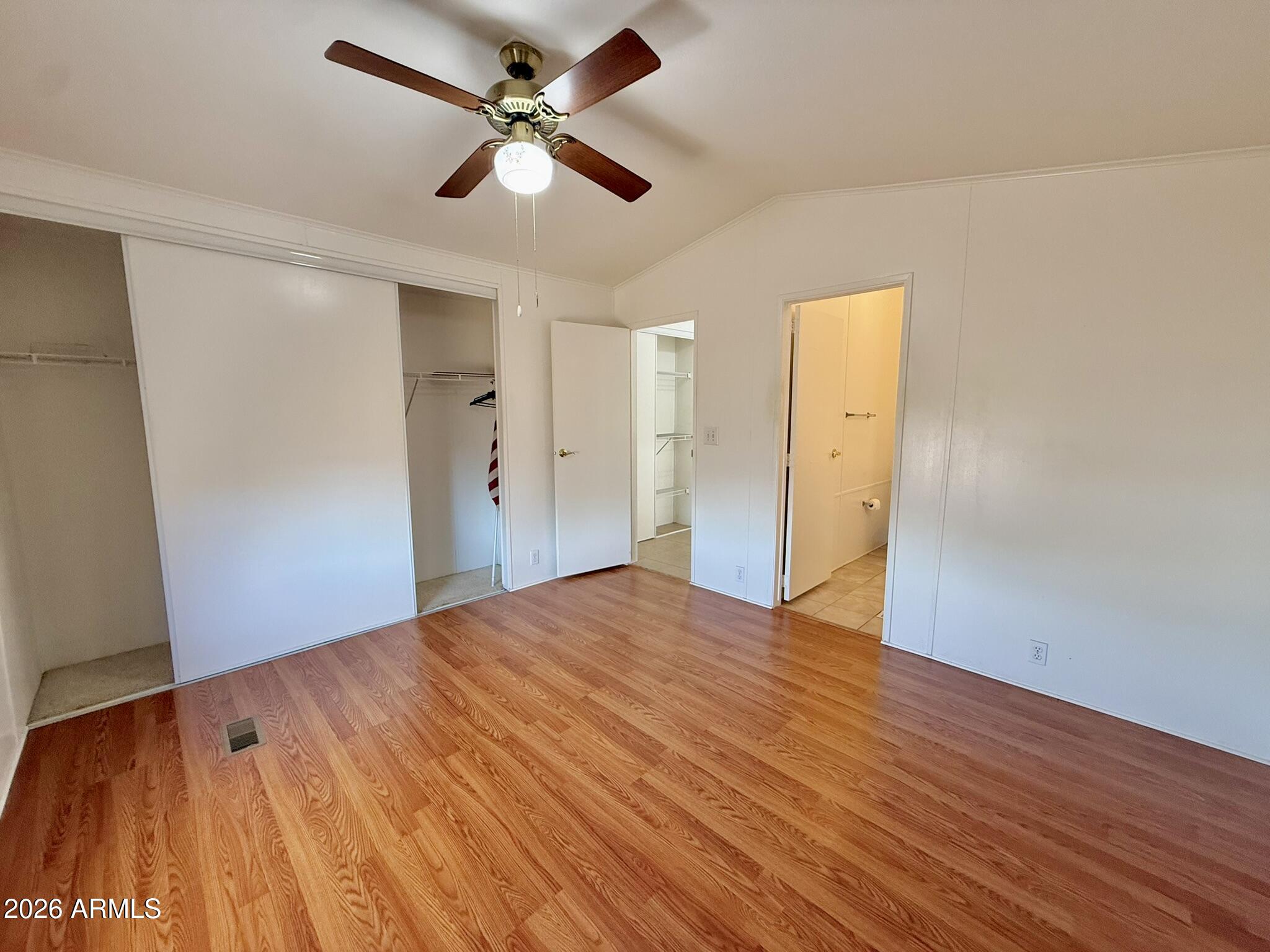 601 North Hayden Road, Unit 40 Scottsdale, AZ 85257 - Photo 19 of 48 a view of empty room with wooden floor
