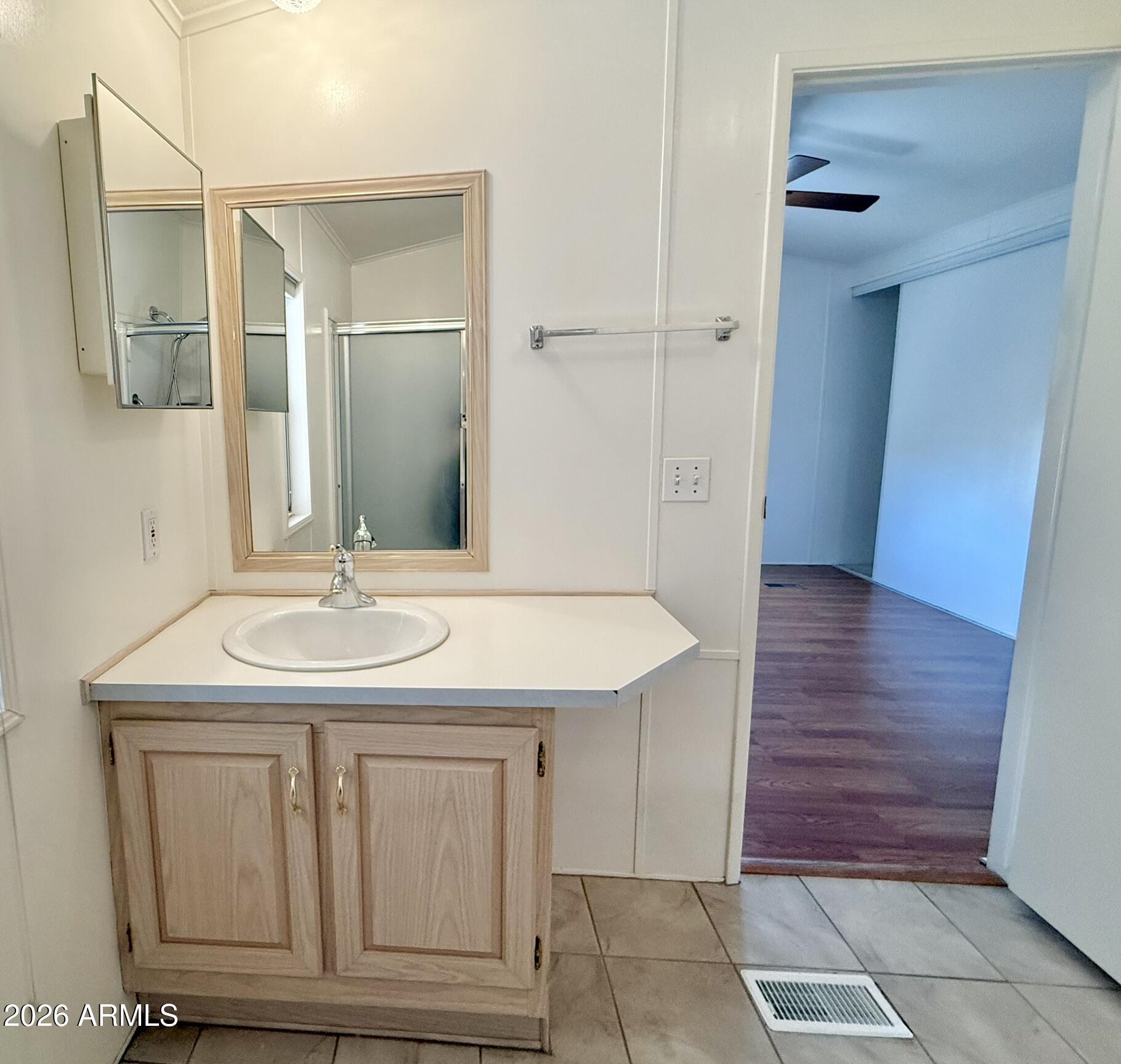 601 North Hayden Road, Unit 40 Scottsdale, AZ 85257 - Photo 21 of 48 a bathroom with a sink and a mirror