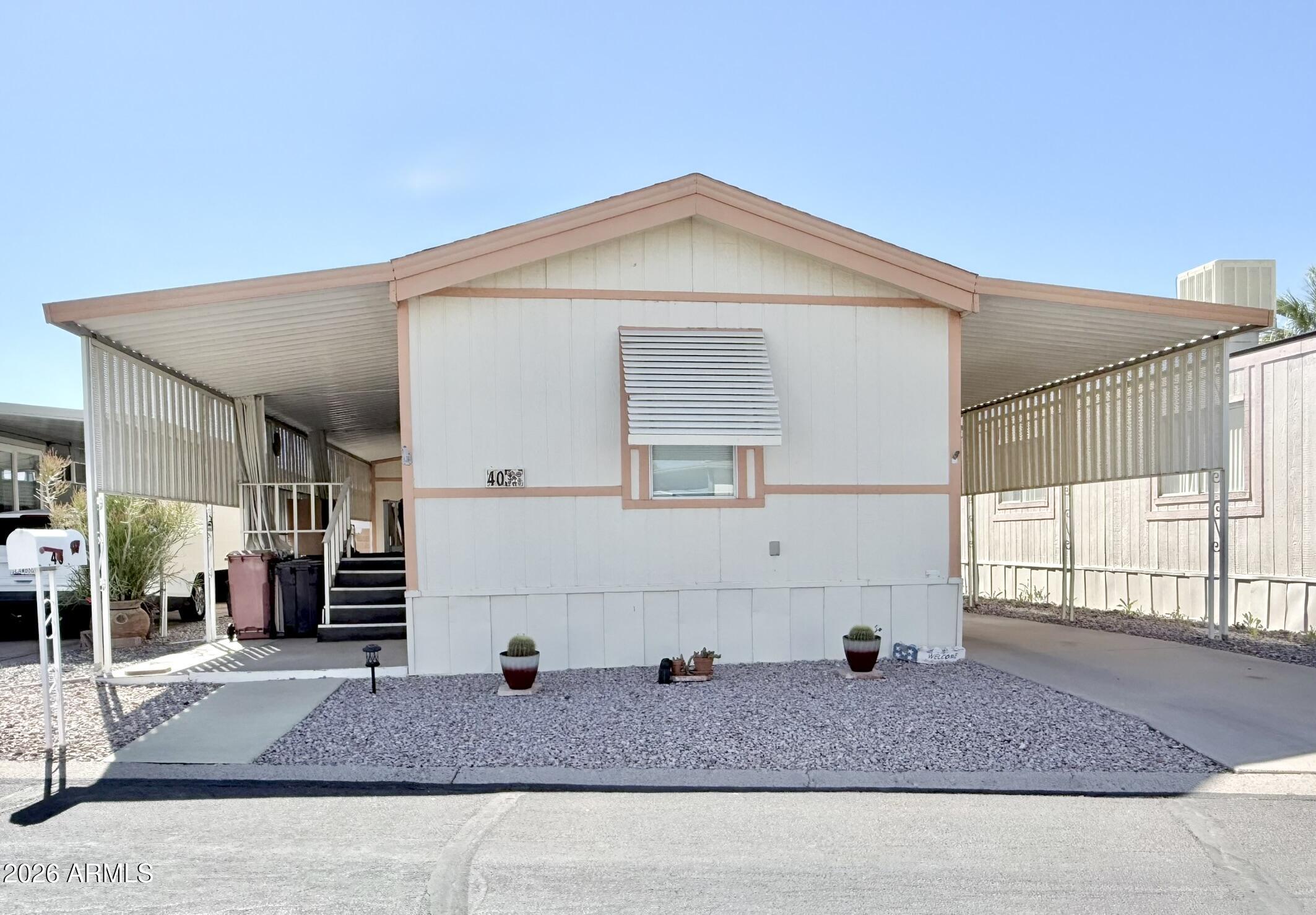601 North Hayden Road, Unit 40 Scottsdale, AZ 85257 - Photo 27 of 48 a kitchen view with fireplace and window