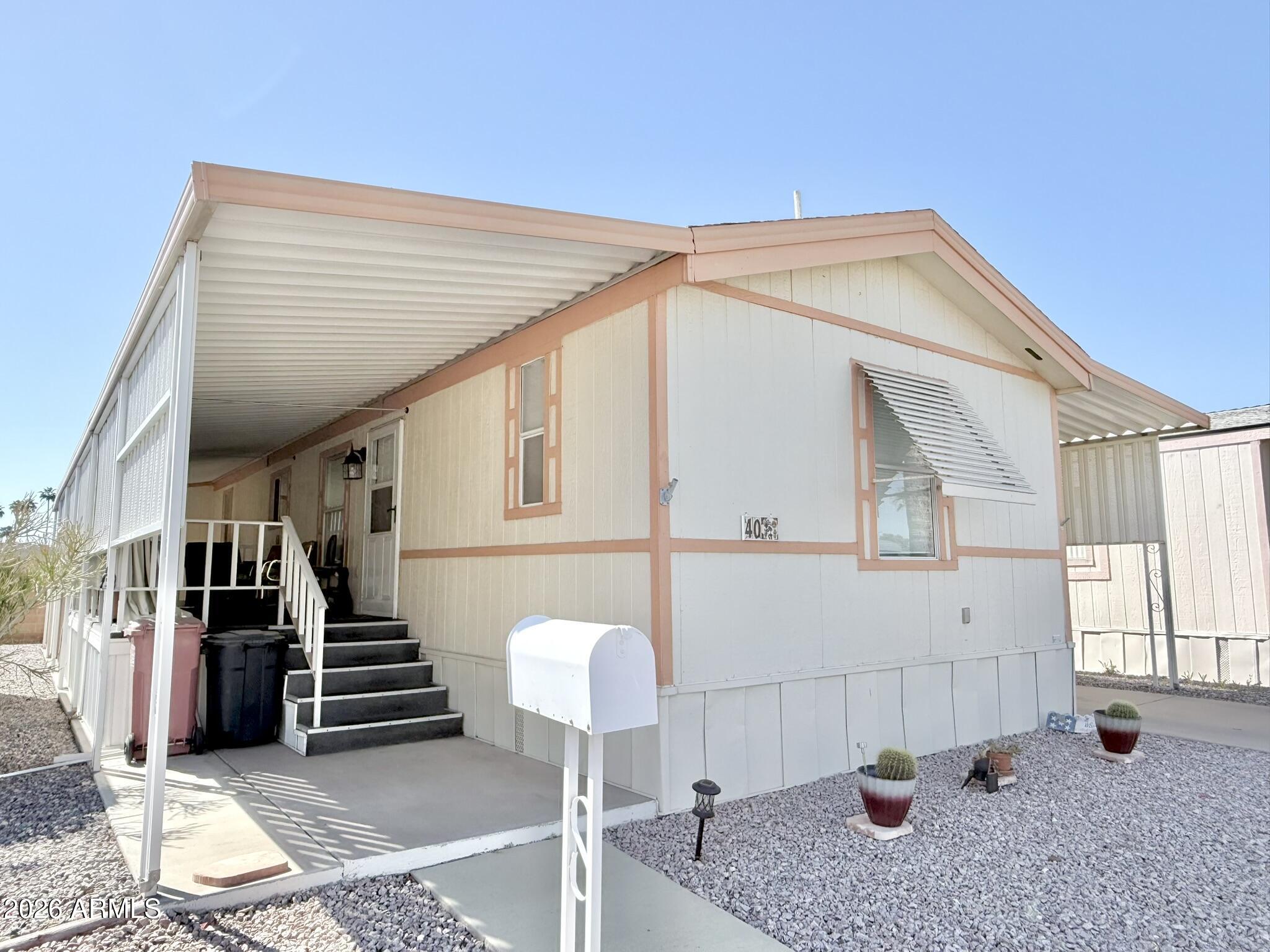 601 North Hayden Road, Unit 40 Scottsdale, AZ 85257 - Photo 28 of 48 a view of an house with entryway